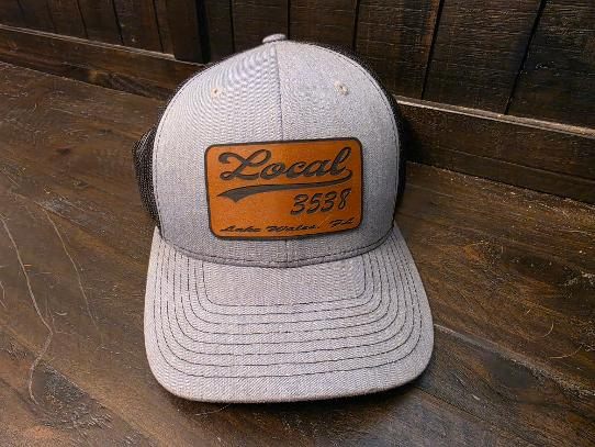 Heather grey Richardson 112 trucker hat with union local leather patch